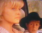 Tammy MacIntosh as sr. Annie Rogers in The Flying Doctors (together with young guest actor Brendan Peel)