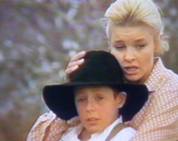 Tammy MacIntosh as sr. Annie Rogers in The Flying Doctors (together with young guest actor Brendan Peel)