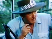 Terry Gill as sgt. Jack Carruthers in The Flying Doctors.