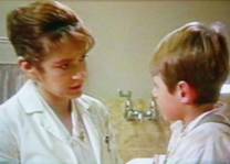 Melita Jurisic as Dr. Magda Heller in The Flying Doctors, together with guest-actor Brendan Peel. 
