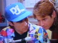 The radio is the vital instrument of the Flying Doctors. Not only do the doctors conduct daily radio clinics, many emergencies come in through the radio, too. (In the picture: George Kapiniaris as radio operator  DJ, and Brett Climo as dr. David Ratcliffe.)