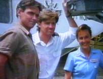 The Flying Doctors: Andrew McFarlane as Dr. Tom Callaghan, Justin Gaffney as Capt. Gerry ONeill, and Lenore Smith as Sr. Kate Standish, posing in front of the Nomad. 