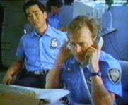 Hank Katts (Jesse Collins) and Ron Nakemura (Denis Akiyama) in Katts and Dog / Rin Tin Tin K-9 Cop. 